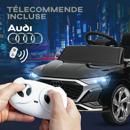 Audi Q8 Etron Sportback 24V-  équipée d’une télécommande, phares, klaxon et du Bluetooth