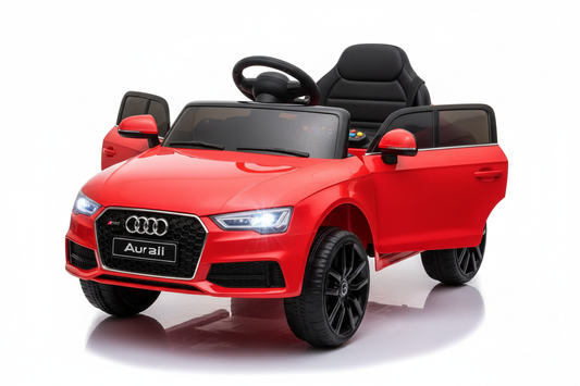 une voiture Audi pour enfant sur un arrière plan blanc